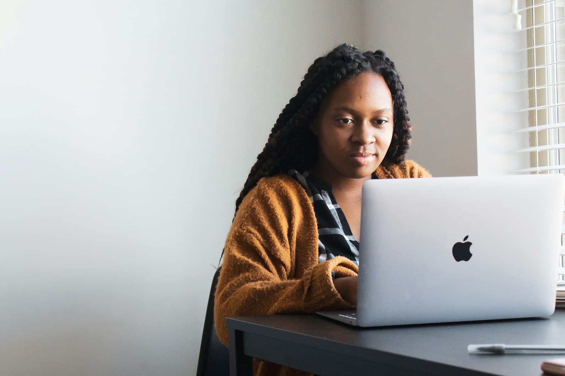A student working on an application on a laptop