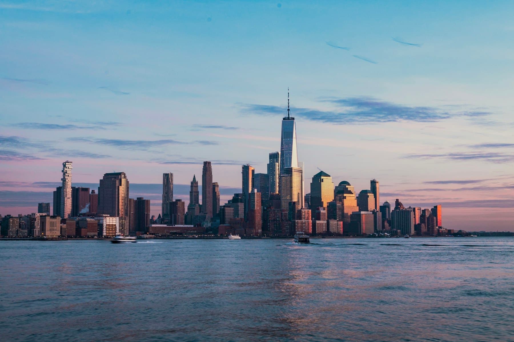 The New York skyline across the Hudson River at dusk
